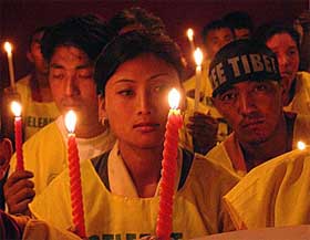 Tibetans in Kolkata take part in a procession demanding the release of Tibetan religious leader Tulku Tenzin Delek from a Chinese jail, in Kolkata on Sunday