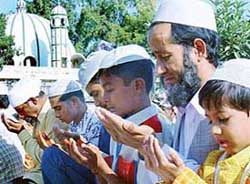 Muslims pray outside the Sector 20 Jama Masjid on the occasion of Id-ul-Fitr in Chandigarh on Monday. 