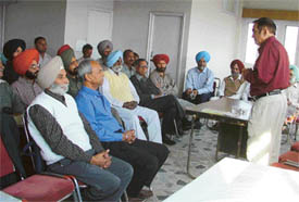 Dr Tejinder Sibia speaks at a function organised by the Shaheed Bhagat Singh Vichar Manch in Ludhiana on Monday