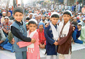 Muslim children greet each other on the occasion of Id in Ludhiana on Monday