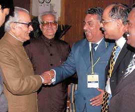 Vice-President Bhairon Singh Sekhawat shakes hands with Chandigarh lawyer Anil Malhotra as Mr Ram Niwas Mirdha looks on at the second International Law Conference in New Delhi on Monday, standing on the right is another Chandigarh lawyer Ranjit Malhotra.