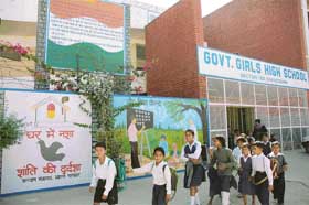 Illustrations on drug addiction and adult education adorn the walls of Government High School, Sector 25. 