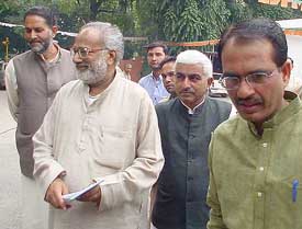 Haryana BJP leaders Ramvilas Sharma, Ganeshi Lal and Kishan Sangwan with Mr Shivraj Singh Chauhan come out after a meeting on the forthcoming Haryana Assembly elections at the BJP headquarters in New Delhi on Wednesday