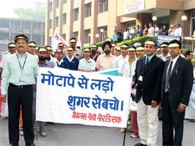 Diabetics and staff of Christian Medical College and Hospital, Ludhiana, participate in a march to spread awareness about the disease