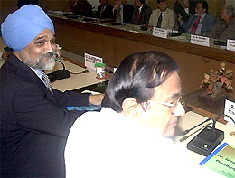 Union Finance Minister P. Chidambaram with Planning Commission Deputy Chairman Montek Singh Alhuwalia at a meeting with World Bank President, James Wolfensohn in New Delhi on Thursday