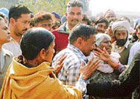 wailing relatives of the victims