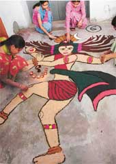 Kaleidoscope of colours: Students display rangoli at Lyallpur Khasa College. 