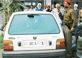 A car that was damaged in a clash between two groups in the District Courts complex in Ludhiana on Thursday