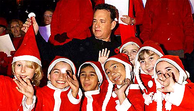 US actor Tom Hanks poses with school children as he arrives for the European premiere of Polar Express 