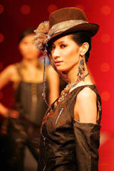 Chinese models parade during the 10th China New Fashion Designers' Contest in Beijing