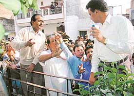 Residents argue with MC officials.