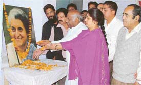 The District Congress Committee President, Mr Jagmohan Sharma, and other leaders pay floral tributes to late Indira Gandhi on her 87th birth anniversary in Ludhiana of Friday