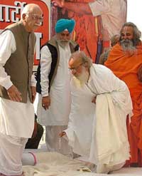 BJP President L.K. Advani, Bapu Asharam, S.S. Ahluwalia and Swami Ramvialas Vedanti at a hunger strike against the arrest of Swami Jayendra Saraswati, at Parliament Street in New Delhi on Saturday. 