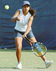 Isha Lakhani of Mumbai University during the All-India Inter University Tennis Tournament played on Panjab University campus