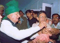 Chief Minister Om Prakash Chautala administers polio drops to children at Mahendragarh on Sunday