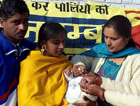 A one-month-old child being given polio drops at Purana Bazar in Sundernagar 