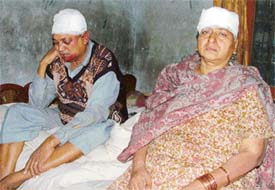 Mr Parshotam Lal and his wife after a robbery in their house in Ludhiana