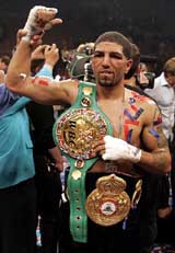 WBC/WBA super welterweight champion Winky Wright poses with the WBC and WBA belts after his title defence against Shane Mosley at the Mandalay Bay Events Centre in Las Vegas