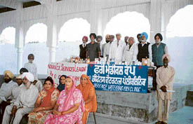 A team of doctors and some of the patients at the Gurdwara Chamkaur Sahib camp.