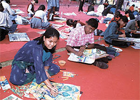 Children participating in the Pragyan-on-the-spot painting competition at Noida