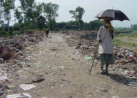 A view of the waste dumped at the back of the Pathankot Civil Hospital.  