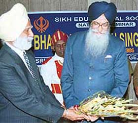 Tamil Nadu Governor S.S. Barnala being presented a bouquet by Mr Gurdev Singh, president of the Sikh Educational Society