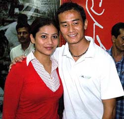 Indian soccer star Baichung Bhutia  with his girlfriend Madhuri