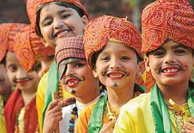 Students of C.L. DAV School wait for their turn to perform at their annual function