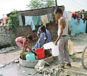 A major source of water wastage in slums and markets