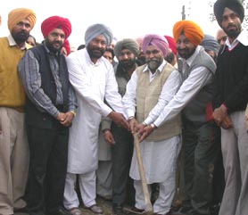 Mr Malkiat Singh Dakha, MLA, and Mayor Nahar Singh Gill inaugurate the widening of the Ladhowal-Nurpur road at Ladhowal