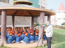 Mumbai-based documentary maker G.L. Bharadwaj shoots a yajna scene at a school in Panchkula on Thursday.  