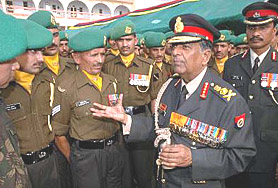 Chief of the Army Staff N.C. Vij makes a point while interacting with jawans on the occasion of the silver jubilee of 17 Dogra Somewhere in the Western Sector on Thursday.
