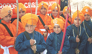 Students of Ambika Public School, Kharar, take out a nagar kirtan procession on the eve of Gurpurab in Kharar on Thursday.