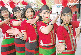 Students of DAV Public School, Sector 8, Chandigarh, perform during their World Continents exhibition on the school premises on Friday. 