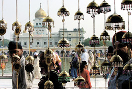 Sikh devotees throng the historic Bangla Sahib Gurdwara on the occasion of Gurpurb to celebrate the birth anniversary of Guru Nanak Dev in the Capital on Friday.