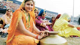 Girls perform at the inaugural ceremony of the Punjab Schools Inter District Athletics Meet at Guru Nanak Stadium
