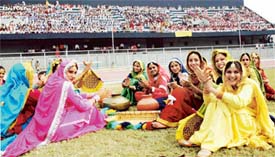 Girls perform at the inaugural ceremony of the Punjab Schools Inter District Athletics Meet at Guru Nanak Stadium