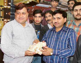 Mr Kewal Krishan returns money to bank manager