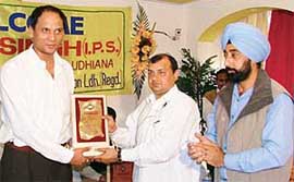 SP-City-I R.K. Jaiswal was honoured by Municipal Councillor Gurpreet Gogi, in Ghumar Mandi, Ludhiana on Saturday. 