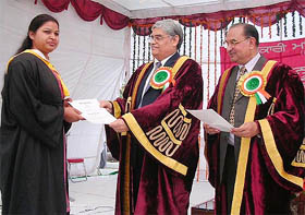 Punjab Higher Education Language and Planning Department Secretary A.R. Talwar presents a degree to a student at the annual convocation of Govt. Mohindra College in Patiala