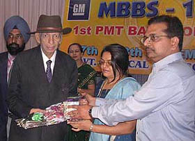 Former Government Medical College, Patiala, teacher Dr Sohan Lal being honoured by old students at Patiala