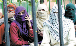 Rural women sitting on a dharna under the banner of Delhi Grameen Vikas Panchayat in protest against the House Tax in the Capital on Monday.