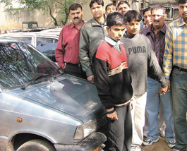 Car thieves, Saleem, alias Mamu, and Anwar, alias Nadeem, who were arrested by the Delhi Police Special Branch, South-West Dist, at Dhaula Kuan police post in the Capital on Monday.