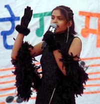 A student sings a song in a competition