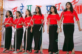 A team takes part in a group song competition at the PU Zonal Youth Festival 