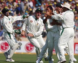 South African players rejoice after taking the wicket of Virender Sehwag on the third day of the Kolkata Test on Tuesday