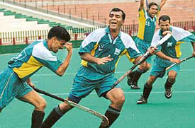 Sunil of Maintenance Command in jubiliant mood after scoring a match-winning goal against the Training Command at the Air Force Hockey Tournament match at Sector-42 Stadium in Chandigarh on Wednesday. 