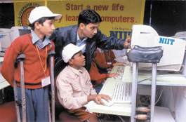 Physically challenged children at a computer training session organised by NIIT on the World Computer Literacy Day in the Capital on Wednesday.