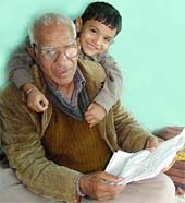 Shiv Nath with his grandson.