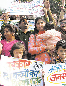 Activists of NGO Surbhi Pariwar demanding that a Bill on two-child norm be tabled in Parliament at Jantar Mantar in the Capital on Friday.